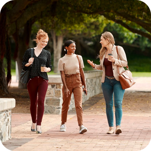 500x500_rounded sqaure_women-walking-outdoors-coworkers-working-young